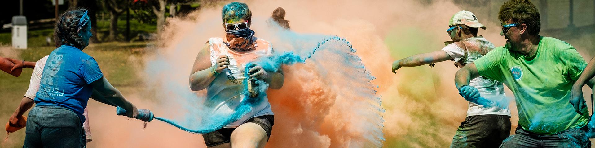 Students running during the Color Wars memorial run